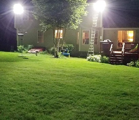 A garden lawn lit for evening use